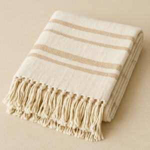 Manta de exterior con rayas y flecos